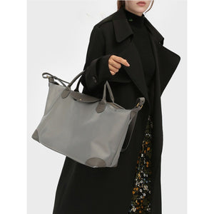 Minimalist Leather - Trimmed Day Tote for Quiet Carry Travel and City Days - Thestillmoving.com